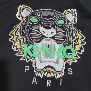 Used men’s  Kenzo zip up hoodie with missing draw string.